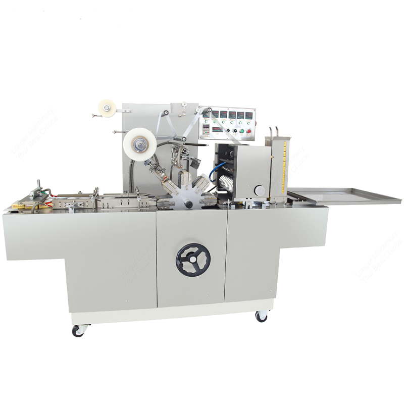 عکس دستگاه سلفون کش جعبه در زمینه سفید