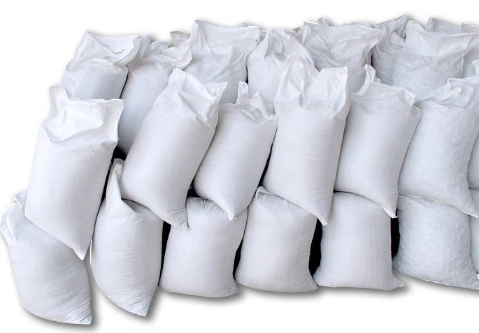 عکس گونی های روی هم چیده شده و پر شده