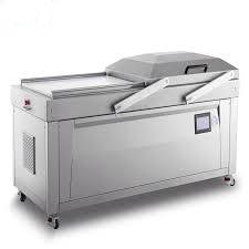 عکس دستگاه سیل وکیوم اتوماتیک در زمینه سفید