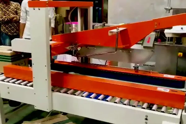 عکس دستگاه چسب زن کارتن اتوماتیک