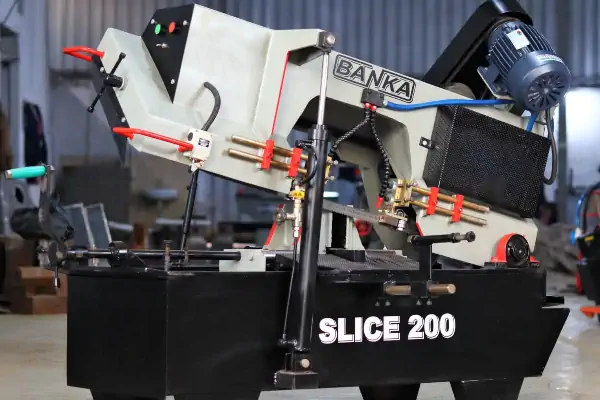 عکس دستگاه دستگاه اره نواری سفید رنگ