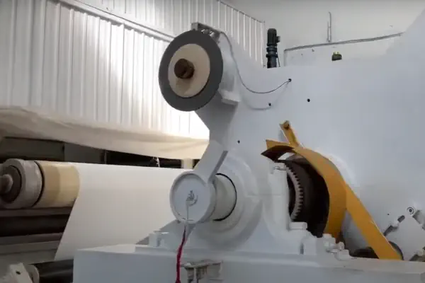 عکس دستگاه تولید کاغذ فیلتر نارنجی رنگ به صورت رول