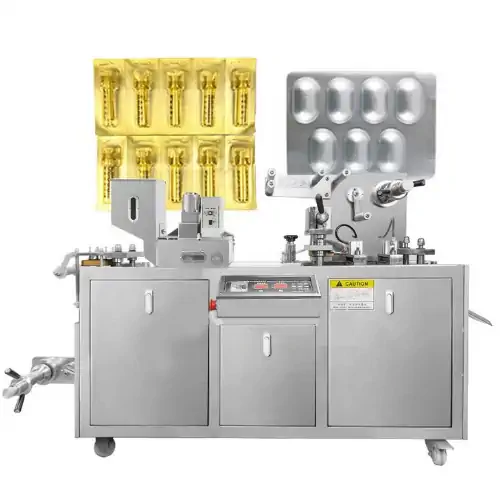 عکس دستگاه آلو بلیستر در کنار قرص سفید و کپسول زرد