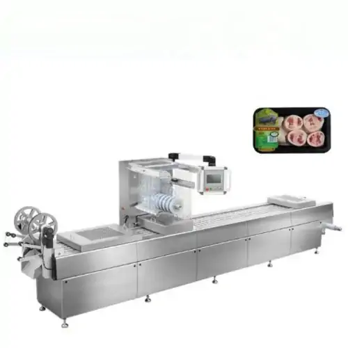 عکس دستگاه فرم فیل سیل  الویه در کنار سینی سیاه رنگ کوچک حاوی انواع گوشت ماهی و مرغ و قرمز