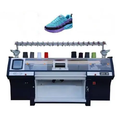 عکس دستگاه دوخت کفش پارچه ای به همراه کفش آبی پارچه ای در بالای تصویر