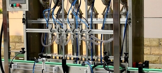 عکس دستگاه پرکن مایعات