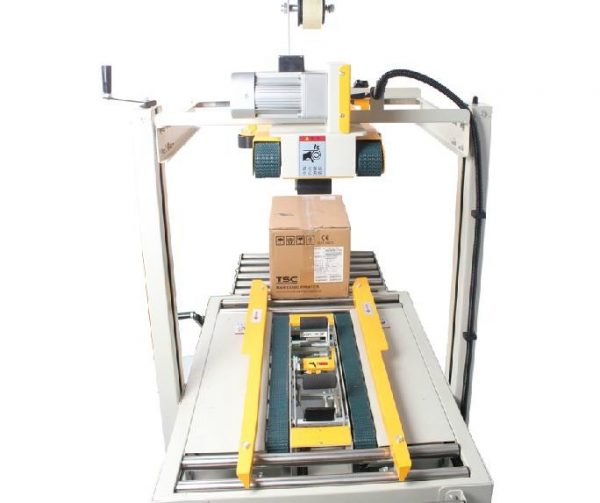 عکس طولی دستگاه چسب زن کارتن CH300 در حین کار